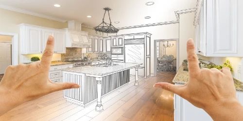 Planering av köksrenovering med skiss och händer som ramar in motivet.